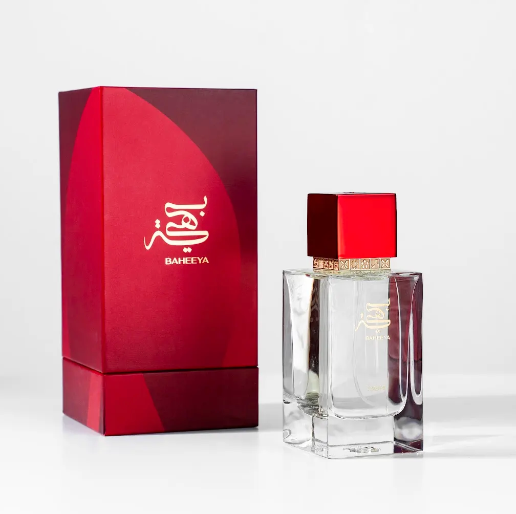 Perfume bottle and packaging with 'BAHEEYA' branding on a white background