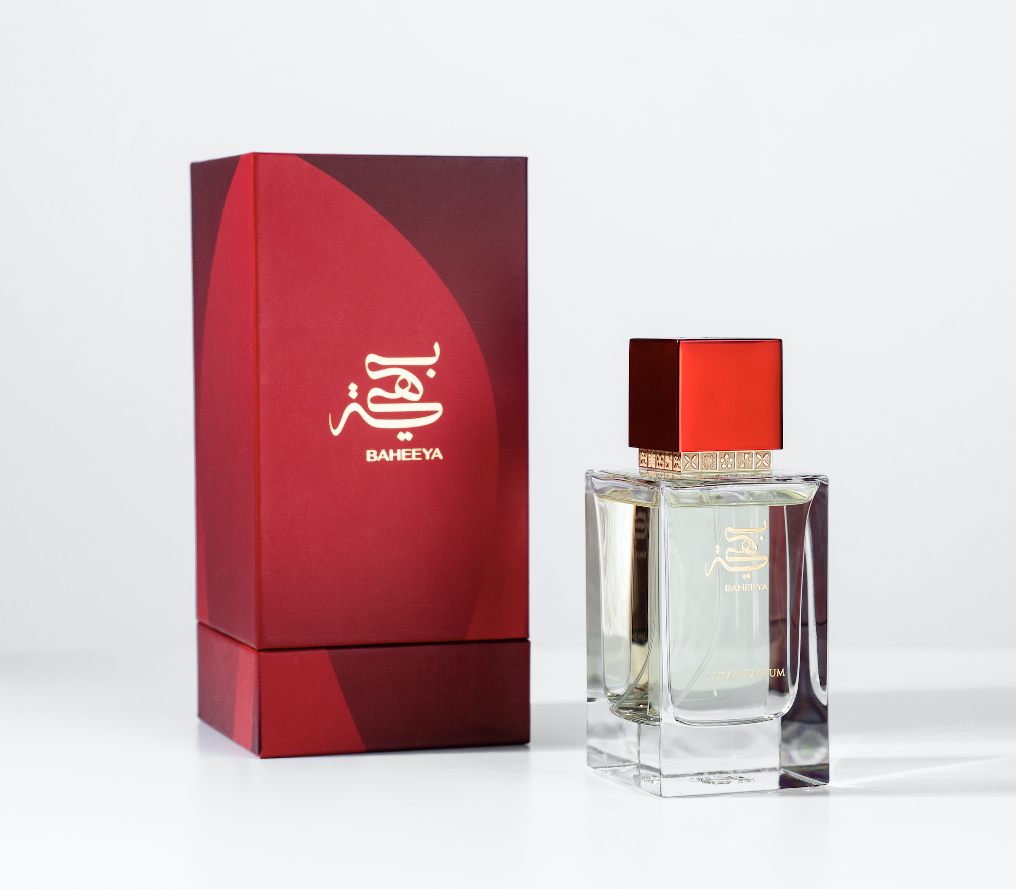 Perfume bottle and packaging with 'BAHEEYA' branding on a white background