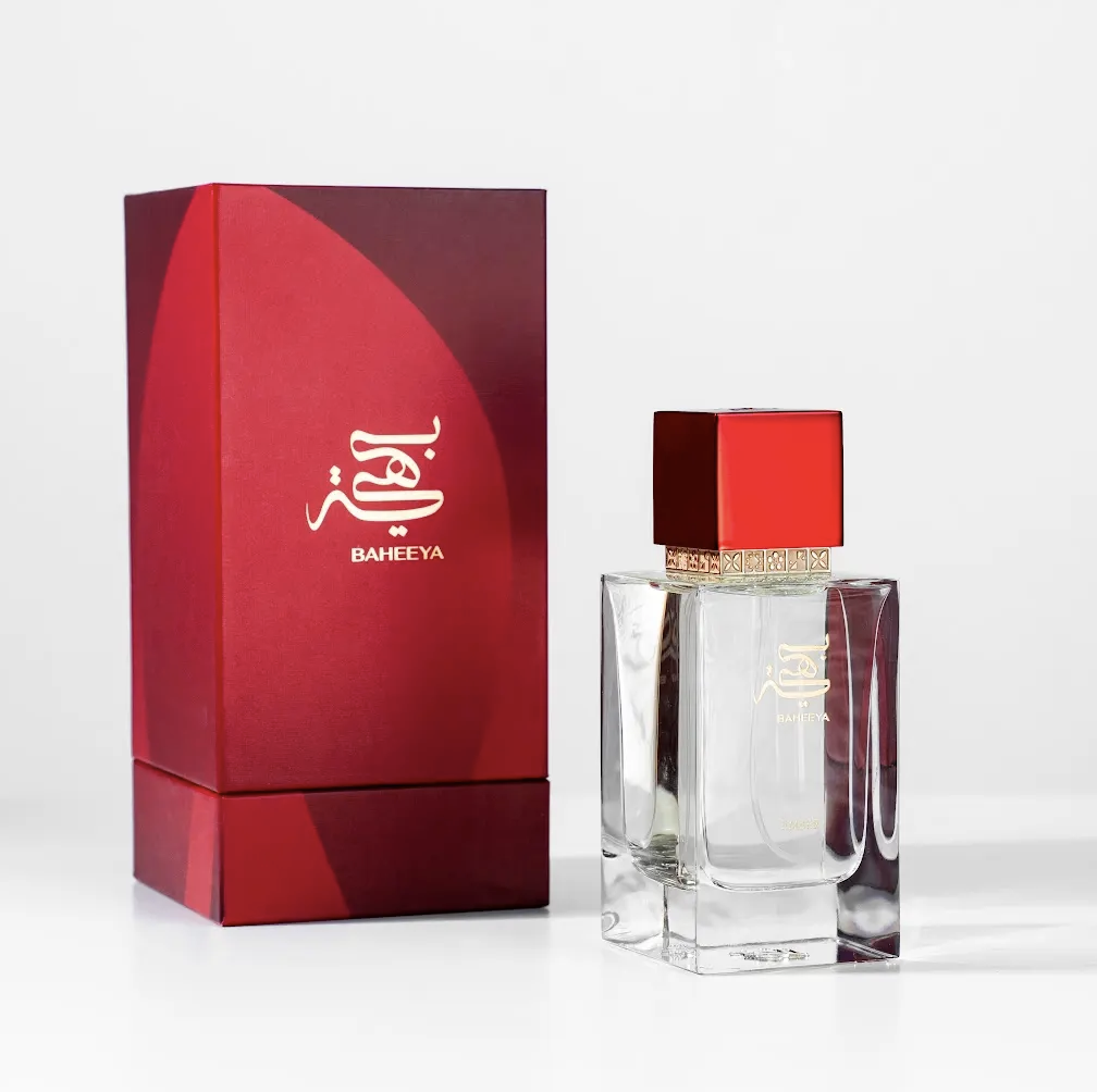 Perfume bottle and packaging with 'BAHEEYA' branding on a white background